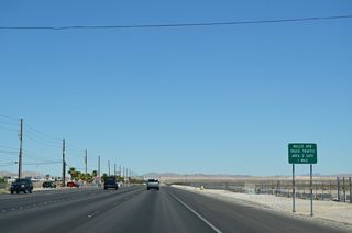 Hollywood Boulevard stems north from SR 604 (Las Vegas Boulevard) to Speedway Boulevard, one mile southwest of Minot Avenue and the Nellis AFB Area II Gate.