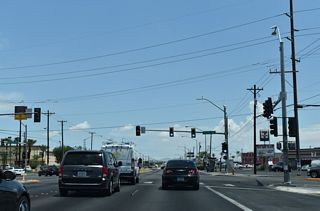 Pecos Road runs along the east North Las Vegas city line from Owens Avenue north to Alexander Road. SR 604 enters the unincorporated community of Sunrise Manor beyond the signal at Pecos Road.
