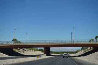A decorative overpass carries Anasazi Drive over Summerlin Parkway. The interchange was completed by 2007.