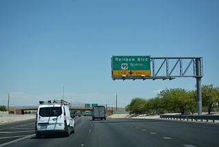 Exit ramps depart simultaneously from Summerlin Parkway east for SR 595 (Rainbow Boulevard) and I-11/U.S. 95 (Oran K. Gragson Freeway) north. U.S. 95 continues through northern reaches of the west valley toward Tonopah and Reno (via U.S. 50).