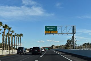 An auxiliary lane opens along SR 613 (Summerlin Parkway) east from the Town Center Drive entrance ramp to the parclo interchange with Rampart Boulevard.