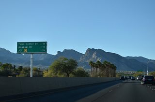 Town Center Drive connects SR 613 with the commercial center of Summerlin north to Village Center Circle and south to Summerlin Hospital Medical Center.