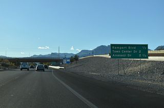 A parclo interchange (Exit 3) joins Rampart Boulevard with Summerlin Parkway in a half mile.