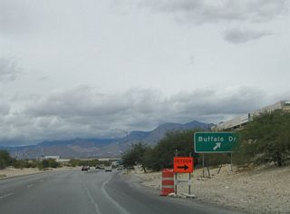 Three westbound lanes and an HOV-lane converge at the Buffalo Drive off-ramp now. Buffalo Drive leads north to The Pueblo community in east Summerlin.