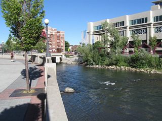 Looking east on the Reno River Walk toward the Sierra Street bridge, the Truckee River has a walled flood control channel as it passes through downtown Reno.