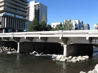 Arlington Avenue crosses the Truckee River in Wingfield Park; this view looks northeast at the bridge from pedestrian walkway in the park.