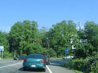 The town of Carmel lies 3.5 miles west from Exit 65 via NY 312 and U.S. 6.