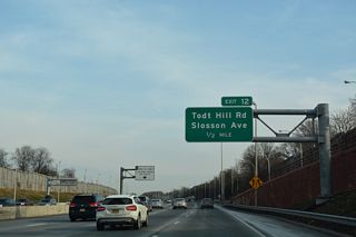 Points of Interest for Exit 12 include Staten Island Zoo at Clarence T. Barrett Park and Historic Richmond Town. Richmond Town represents the first county seat of the original Richmond County. That area of Staten Island is located along Richmond Road southwest of Grant City and New Dorp from the south end of Todt Hill Road.