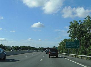 Lower Hudson Avenue extends north from the diamond interchange (Exit 8) with 23rd Street to the Troy-Green Island Bridge. 23rd Street west links with parallel NY 32 (2nd Avenue).
