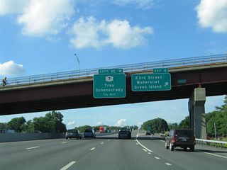 NY 2 (Troy-Watervliet Bridge) passes over Interstate 787 at Exit 8 to 23rd Street. The succeeding exit takes I-787 east onto the Collar City Bridge (NY 7) into Troy.