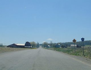 A confirming marker for County Route 49 stands just south of CR 9 (Ossian Hill Road) on McCurdy Road in Ossian.