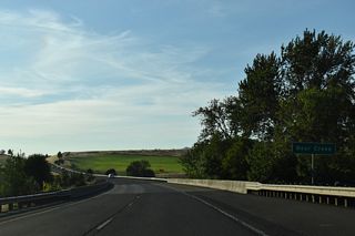 Interstate 5 turns more to the northwest across Bear Creek at mile marker 15.