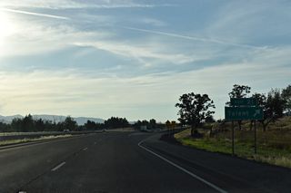 West Valley View Road leads 1.8 miles east from Exit 21 back to South Valley View Road and 0.8 miles west to Main Street in Talent. The road formerly extended west to Talent Avenue, but a roundabout with an extension of E Main Street replaced that connection.