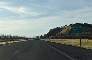 The succeeding exit connects Interstate 5 north with N Phoenix Road in the city of Phoenix. Underway between 2014 and July 2016, the $72 million Fern Valley Interchange project replaced what was a diamond interchange with Fern Valley Road into a DDI. The last ramp at the new exchange opened to traffic on July 22, 2016 (Oregon Department of Transportation, 2016).