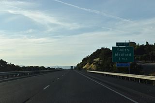 Construction underway in 2007/08 replaced what was a six-ramp parclo interchange linking I-5 and Barnett Road with a SPUI to the south with Garfield Street / Highland Drive. Exit 27 with Barnett Road serves a tourist information center for the Rogue River Valley and Medford.