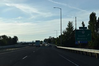 A large area of big box retail and hotels occupies space between Interstate 5 at Exit 27 and OR 99 (Rogue Valley Boulevard). Garfield Street west and Highland Drive north extend from the area into residential neighborhoods in Medford.