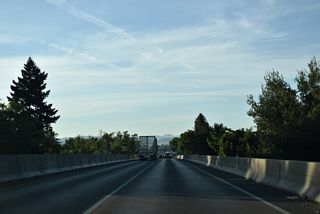 The elevated portion of Interstate 5 runs alongside Bear Creek north from E 10th Street.