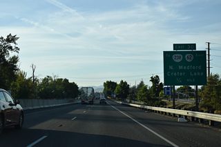 OR 62 (Crater Lake Highway) commences 0.40 miles east of I-5 at OR 99 (N Pacific Highway) and OR 238 (Rossanley Drive). OR 62 links the Medford area with Crater Lake National Park to the far northeast. The state route forms a 103.95 mile long arc between Medford and U.S. 97 near Chiloquin.