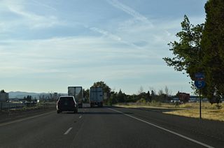 I-5 advances northwest into the city of Central Point. Founded in 1889, Central Point lies at 1,282 feet above sea level and is home to around 19,000 residents. The city&#039;s economy is fueled by agriculture, tourism, timber products and retail trade industries.