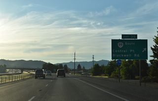 OR 140 lines Blackwell Road 1.2 miles north from Exit 35 to Kirtland Road. OR 140 turns east along Kirtland Road en route to White City and Klamath Falls. The exchange at Exit 35 was originally a diamond interchange. Ramps along southbound were reconfigured to meet OR 99 at Willow Springs Road.
