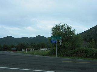 Although not acknowledged from I-5 northbound at Exit 43, OR 234 travels 17.48 miles overall between Exit 43 and OR 62 east of Sams Valley.