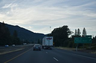 Guide signs for Exit 48 previously referenced the Savage Rapids Dam. The barrier was formerly located four miles east of Grants Pass nearby. The controversial dam was constructed by the U.S. Bureau of Reclamation to serve the Grants Pass Irrigation District. Opponents of the structure advocated for its removal, claiming that the blockage was detrimental to the passage of salmon and steelhead. Federal legislation concurring with the claim was passed and the dam was fully removed by 2009 and replaced with pumps.