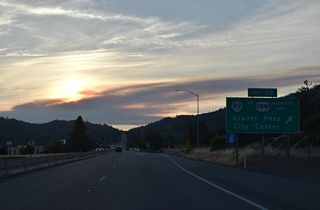 OR 99 follows 6th Street (north) and 7th Street (south) through the Grants Pass city center. The state route follows Rogue River Highway east from U.S. 199 (Redwood Highway) and OR 238 (Williams Highway) to Fruitdale.