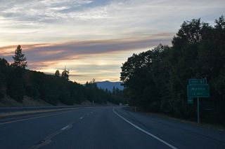 The succeeding exit northbound is with Merlin Road. Merlin Road stems west from Highland Avenue (Historic U.S. 99) adjacent to Exit 61, 4.5 miles to the unincorporated community of Merlin.