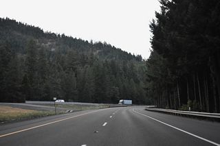 The roadways for Interstate 5 diverge at Stage Road Gulch. They come back together north of mile marker 79.