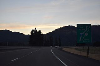 A diagrammatic guide sign outlines the loop into Tri City and the city of Myrtle Creek between Exits 103 and 108. OR 99 is designated along 4.81 miles of Old Pacific Highway and Main Street north from Gael Lane to I-5 northbound.