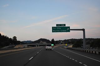 Weaver Road parallels the Southern Pacific Railroad southwest back to Riddle Bypass and Pruner Roads. East from Exit 107, Weaver Road ties into OR 99 (Old Pacific Highway) at Wecks Road.