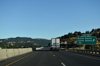Clarks Branch Road travels east from Dole Road into the nearby mountains. Dole Road parallels the freeway northward to Roberts Mountain Road and the unincorporated community of Round Prairie.