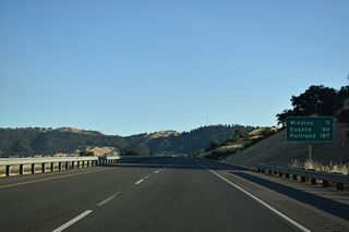 Downtown Portland is 186 miles to the north of Round Prairie.