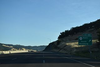 OR 99 (Coos Bay-Roseburg Highway) follows the South Umpqua River north into Roseburg, where the state route separates into the couplet of Stephens Street north and Pine Street south ahead of Downtown.