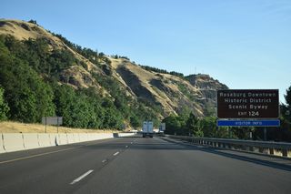 OR 138 overlaps with OR 99 along Stephens Street north out of Downtown to Diamond Lake Boulevard east. An Oregon Scenic Byway, OR 138 continues 71 miles east from Roseburg to Diamond Lake.