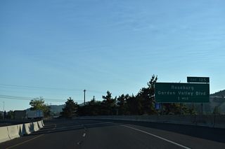 The ensuing exit lies north of the Umpqua River with Garden Valley Boulevard in north Roseburg.