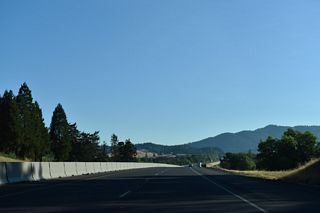 OR 99 remains along the east side of I-5/OR 138 as both highways travels north past the Southern Pacific Railroad siding of Deady.