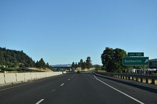 OR 99 diverges northeast from the diamond interchange at Exit 135 and travels 1.7 miles to Central Avenue (former OR 138). Comstock Road stems north from the I-5 access road to Elkton-Sutherlin Highway (former OR 138).