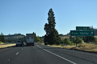 Rice Valley Road continues northwest around Rice Hill to the city of Yoncalla.  Isadore Road ties into the access road at Exit 146 from adjacent ranchland.