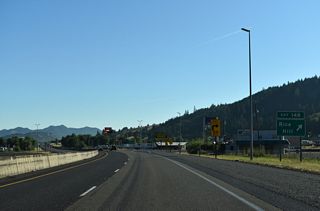 Right in right out (RIRO) ramps at Exit 148 join Interstate 5 with adjacent John Long Road (CR 126A). John Long Road meets the freeway again at Exit 150.
