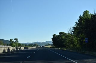 Interstate 5 travels between Yoncalia Creek and ranch land along John Long Road (Old U.S. 99) north through Pleasant Valley.