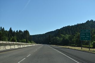 Right in right out (RIRO) ramps at Exit 159 connect Interstate 5 with Elk Creek Road leading back south to Cox Road (CR 96).