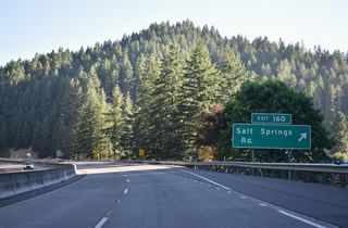Salt Springs Road spurs east from the RIRO ramps at Exit 160 into an isolated area along Thief Creek.