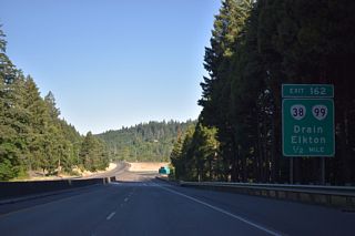 OR 99 (Umpqua Highway) returns to Interstate 5 northbound at a trumpet interchange (Exit 162) by Anlauf. OR 38/99 intersect Curtin Road (Old U.S. 99) 0.75 miles west from Exit 162.