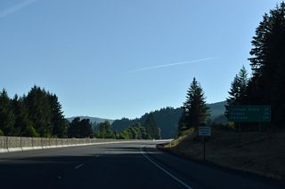 The Cottage Grove city centers lies 9.1 miles northeast of this distance sign via Interstate 5 and OR 99