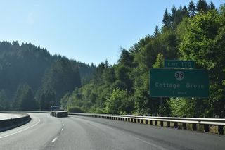 OR 99 separates from Interstate 5 northeast to the city of Cottage Grove from Exit 17. The state route follows the Southern Pacific Railroad for 4.8 miles into Downtown Cottage Grove. 