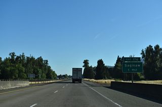 OR 99 (Goshen Divide Highway) follows the Coast Fork of the Willamette River north from Cottage Grove to the unincorporated community of Saginaw. Saginaw Road stems 0.4 miles east from OR 99 at Saginaw to Interstate 5 at Exit 176.