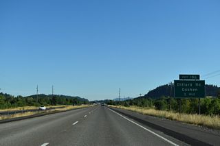 Exit 186 departs I-5 north in one mile to OR 99 and Dillard Access Road. OR 99 and Dillard Access Road both head north alongside Interstate 5 to Goshen. Dillard Road travels west from OR 99 toward Spencers Butte and south Eugene.