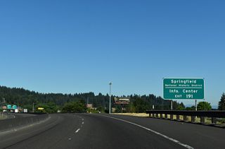 Glenwood Boulevard leads north from adjacent Brackenfern and Moon Mountain Roads to OR 126 Business (Franklin Boulevard). OR 126 Business travels east across the Willamette River to Downtown Springfield.