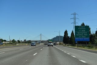 Belt Line Road extends east from the end of OR 569 at Gateway Street. Gateway Street runs south to The Shoppes at Gateway (former Gateway Mall) while Beltline Road becomes Martin Luther King, Jr. Parkway to the east.